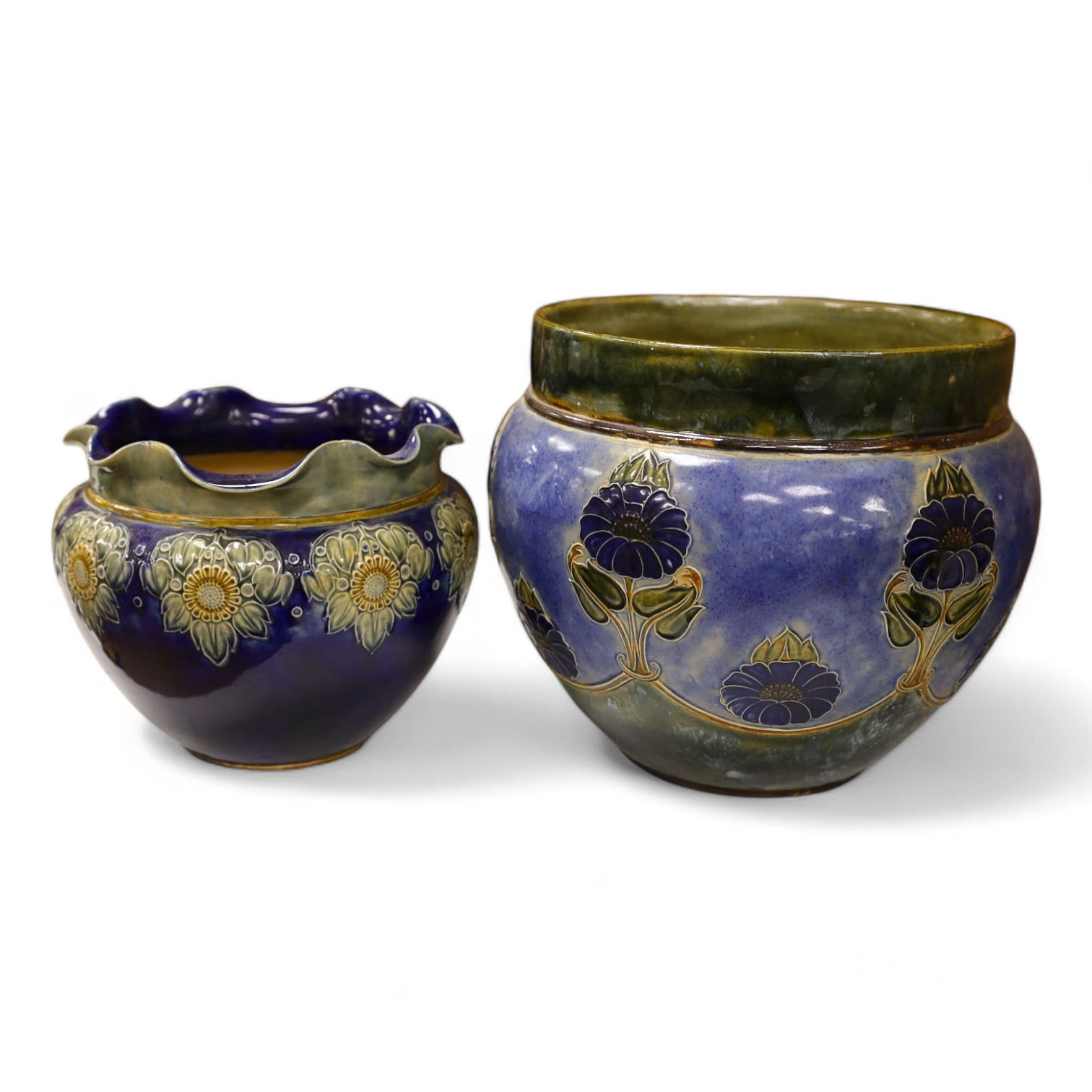 A Royal Doulton blue stoneware jardiniere by Hannah Barlow and another smaller jardiniere by Maude Bowden, largest 29cm in diameter (2). Condition - good